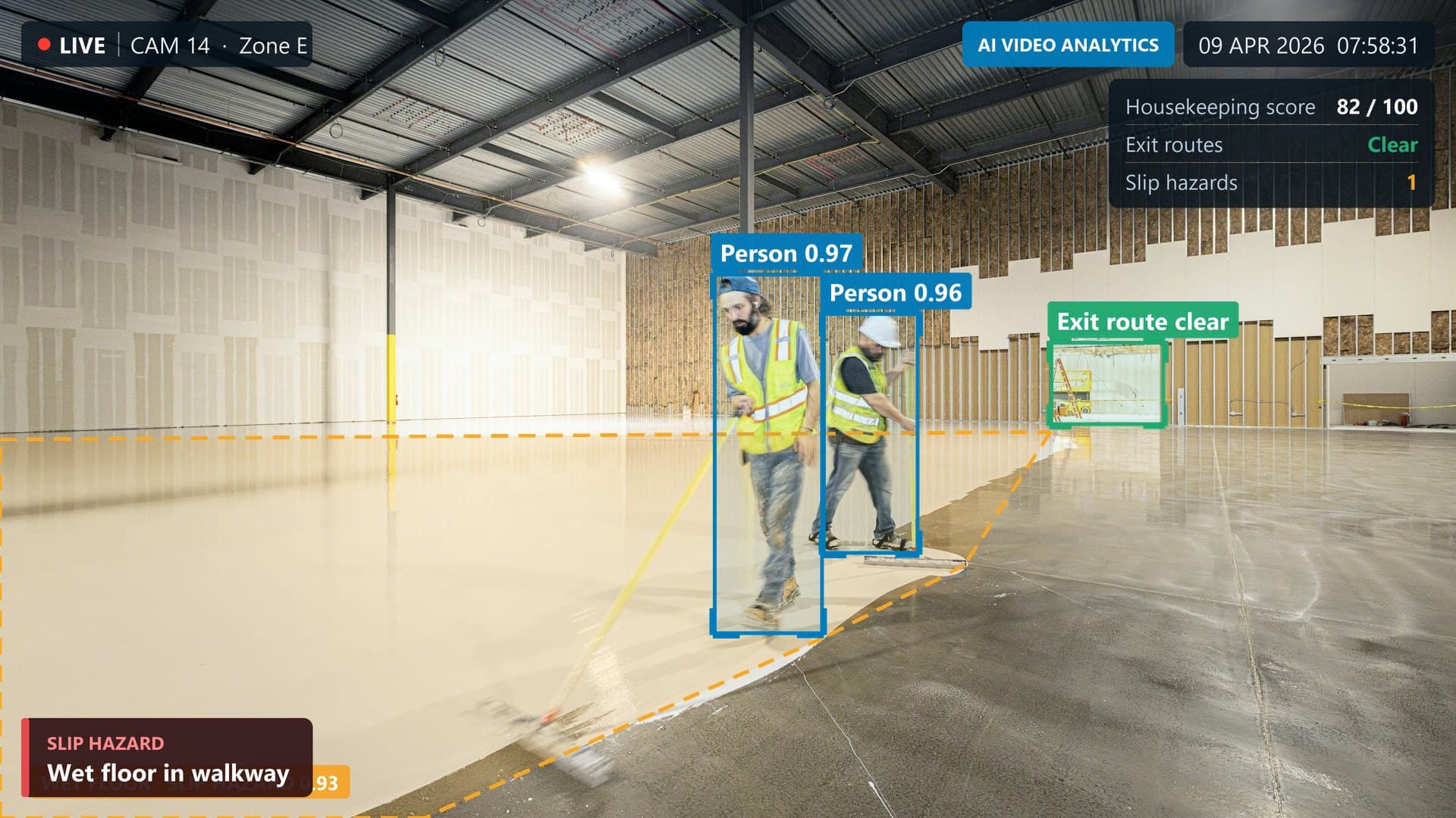AI video analytics detecting a wet floor slip hazard and a clear exit route in a warehouse